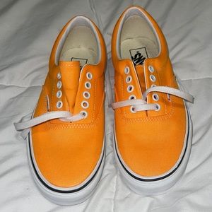 Vans orange unisex shoes. NEVER WORN. Womens 8.5 Men’s 7